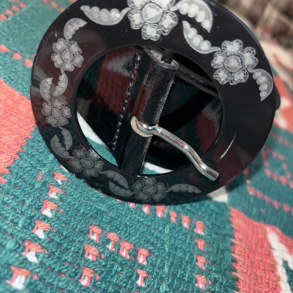 Elegant Black Floral Buckle by [Brand]